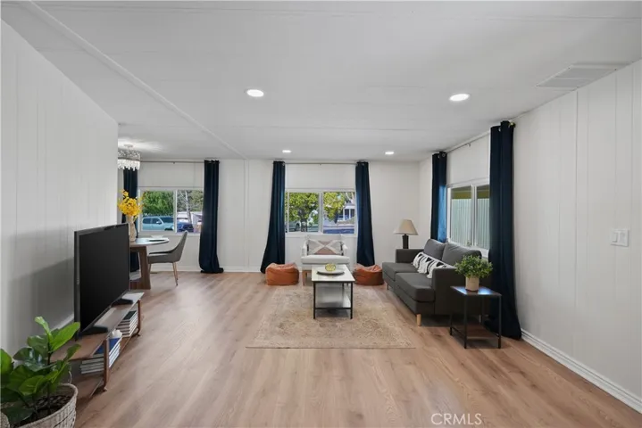 Wide open Living Room with NEW WINDOWS THROUGHOUT