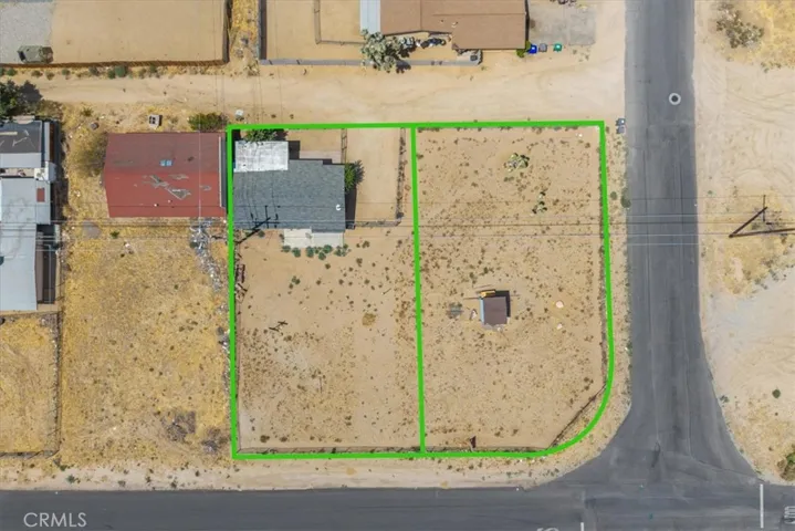 TWO SEPARATE LOTS, ONE WITH THE HOUSE AND THE OTHER VACANT WITH AT STORAGE SHED.