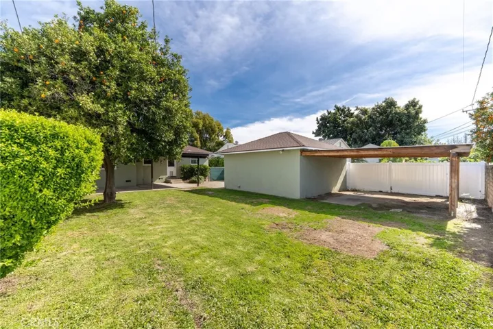Extra covered area behind garage