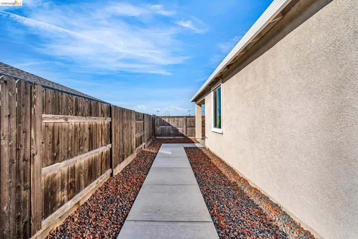 View of fenced backyard