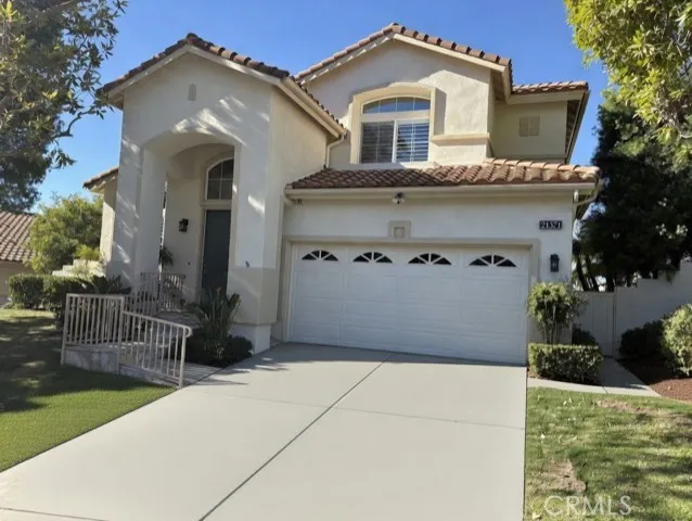Situated on a quiet, single-loaded street, 2 car attached garage