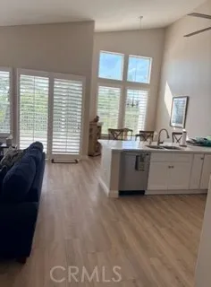 Vaulted ceilings & lots of windows to show off sunset views