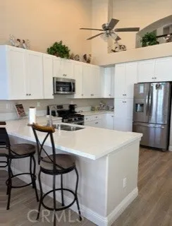 Bright kitchen with new cabinetry, fixtures & appliances