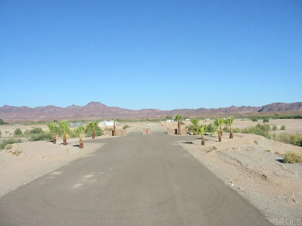 Lot is in Rio Del Sol - a private gated community.  NO HOA