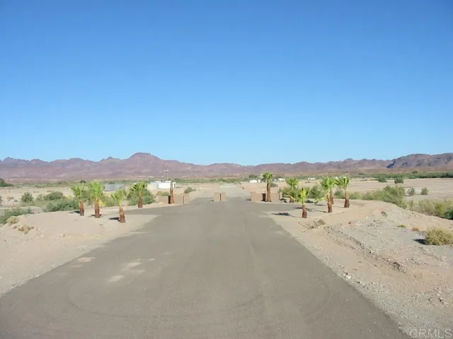 Lot is in Rio Del Sol - a private gated community.  NO HOA