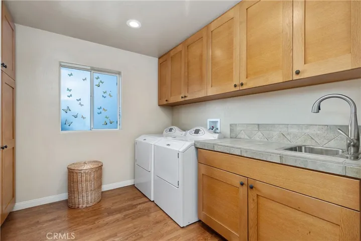 Laundry room with sink