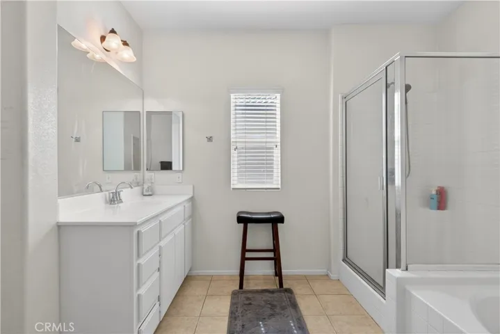 Bathroom #2: Spacious master bathroom featuring dual vanities
