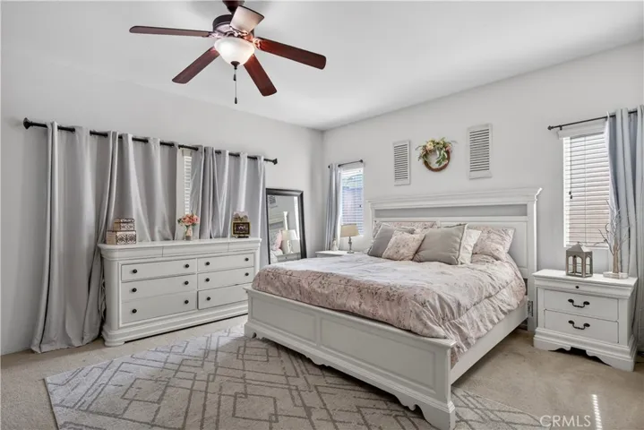 Bedroom #2: Spacious master bedroom featuring a calming color palette, abundant light, and ceiling fan. A functional layout with room to breathe and relax at the end of the​​‌​​​​‌​​‌‌​​‌​​​‌‌​​​‌​​‌‌​​‌‌​​‌‌​​​​ day.