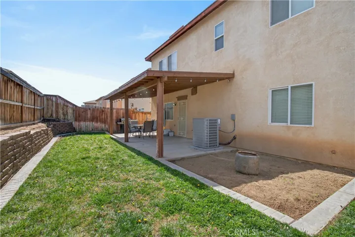 Backyard with patio cover