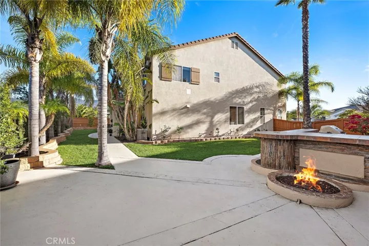 Spacious backyard with firepit