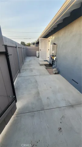 Side Enclosed Patio off the Laundry Area