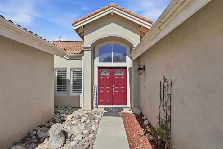 Private gated front courtyard.