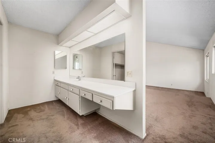 Large primary bathroom with endless potential.