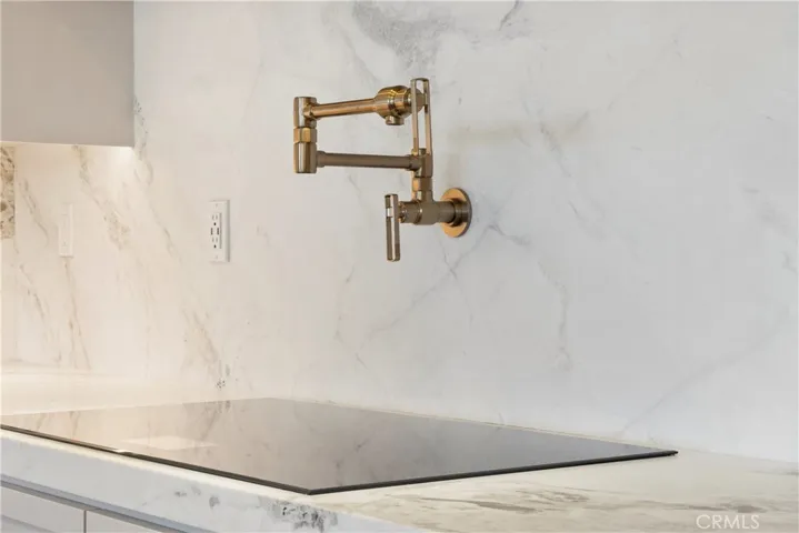 Brizo brushed nickel wall-mounted pot filler