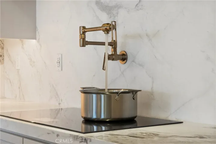 Brizo brushed nickel wall-mounted pot filler
