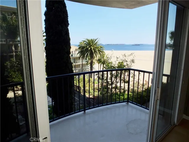 Balcony with ocean and sand view