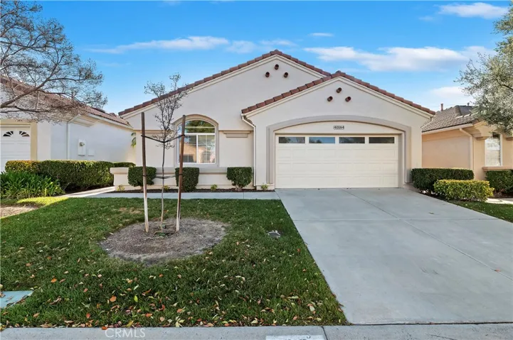 Beautiful single story home on a quiet interior street in The Colony, a gated community for ages 55 plus.