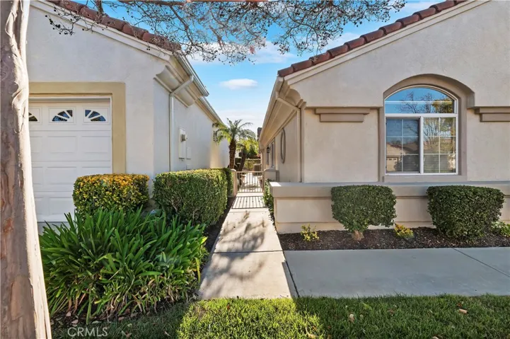 The landscaping was recently refreshed for a clean inviting look.  You will love the afternoon shade on your east facing patio.