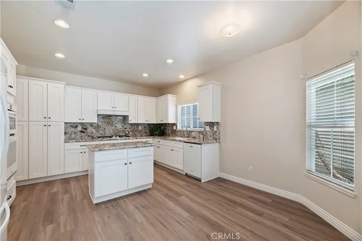 There is plenty of room for a casual eating nook in the kitchen and all of the appliances are included.