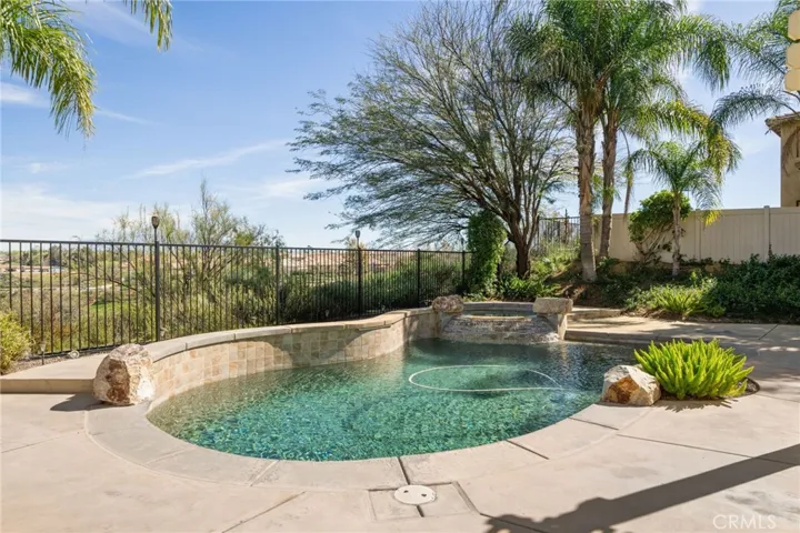 Resort style backyard with pool and spa