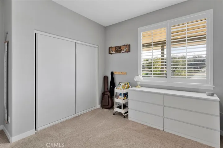 Roomy bedrooms with custom shutters.