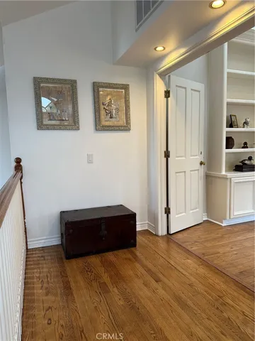 Entry landing to primary suite.