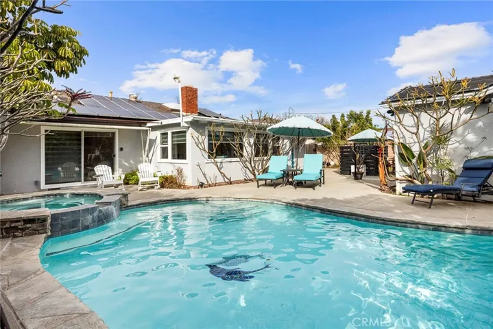 Take a dip in this backyard refreshing oasis!
