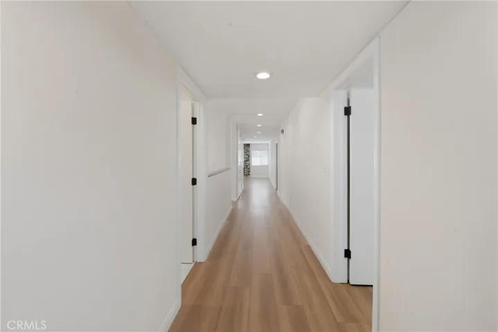 Picture taken from foyer to the large wide hallway of the home