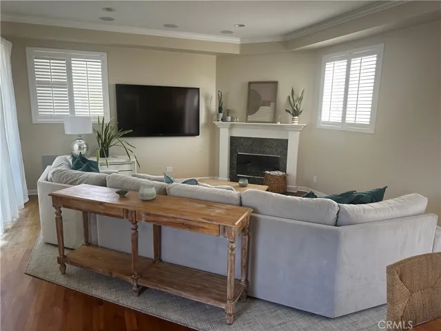 Open Living Room with 2 floor level decks and a roof top deck