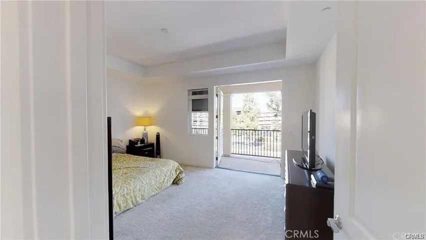 Master bedroom with balcony