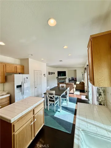 kitchen also features pantry closet...