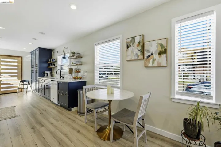 Dining space featuring light wood finished floors and recessed lighting