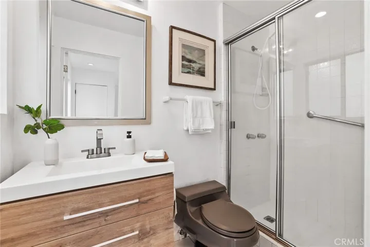 Unit #66 - 3/4 bathroom located adjacent the kitchen.