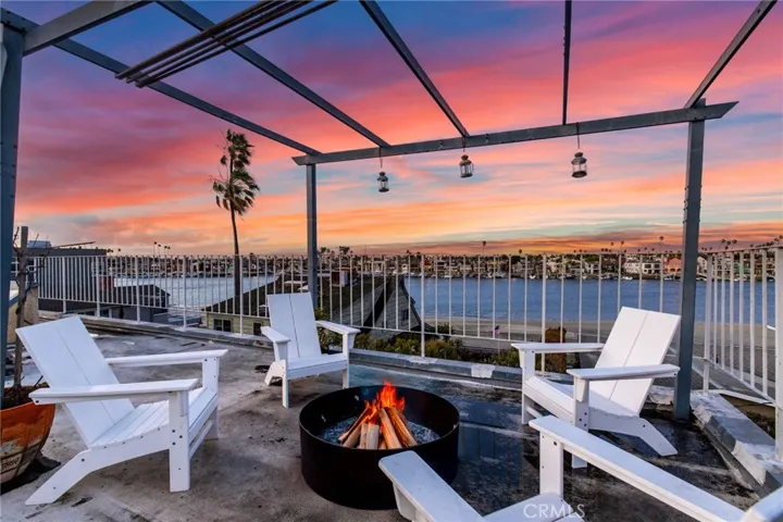 Cozy fireside lounge on the rooftop.