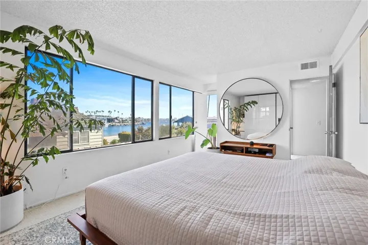 Unit #64 - Beautiful view of the water.  Door leading to second level balcony.