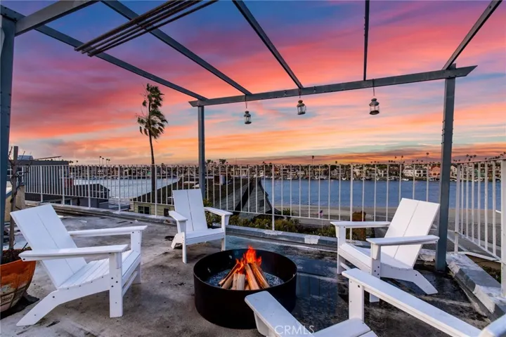 Cozy fireside lounge on the rooftop.
