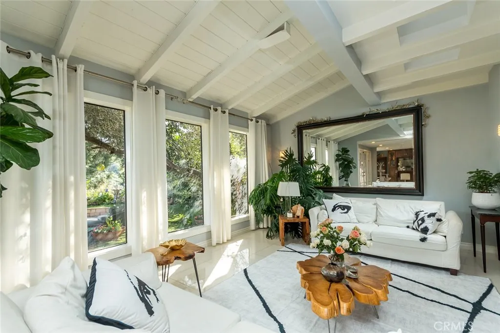 living room sitting area with garden views