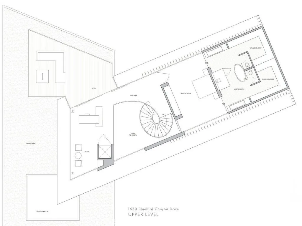 The upper level is dedicated to a private primary suite and flexible office space, positioned to take advantage of elevated views and separation from the main living areas. The layout emphasizes privacy, comfort, and retreat, with generous proportions and a connection to outdoor deck space. This level completes the home’s vertical experience, offering a quiet, elevated sanctuary above the activity below.