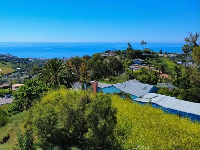 Elevated above Bluebird Canyon with sweeping ocean and Catalina views.