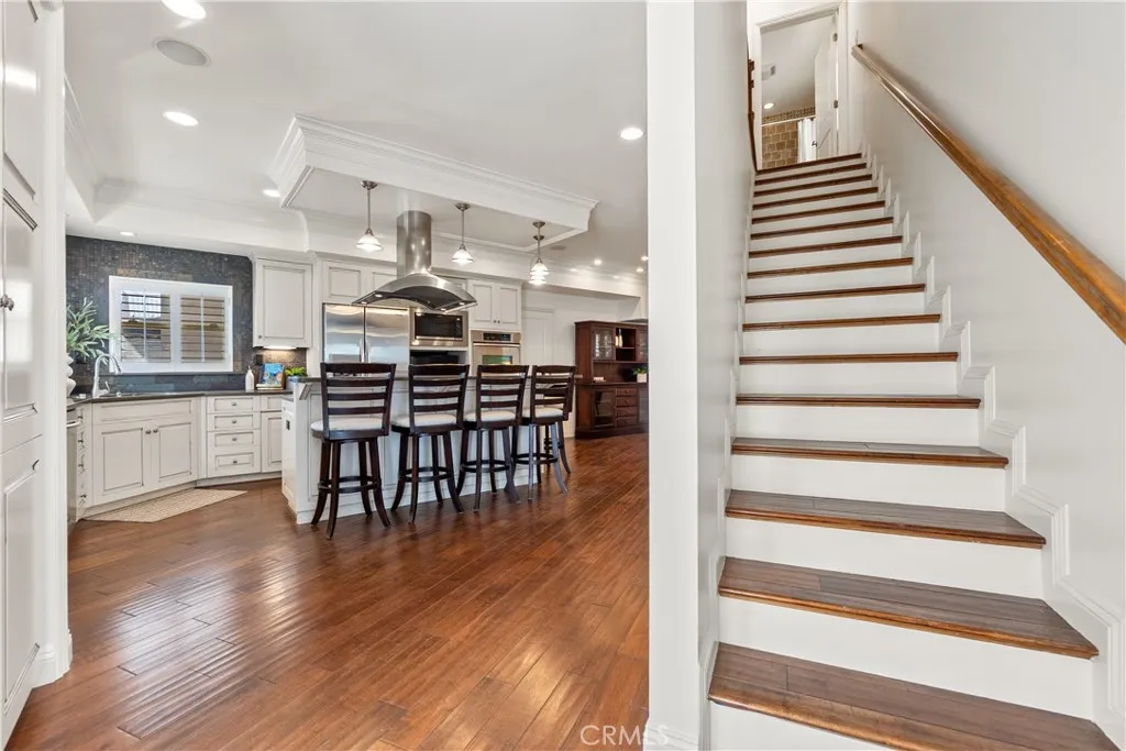View of the staircase to the upper bedroom level.