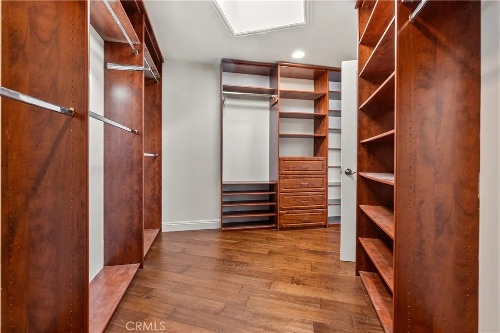 The beautiful custom walk-in closet.