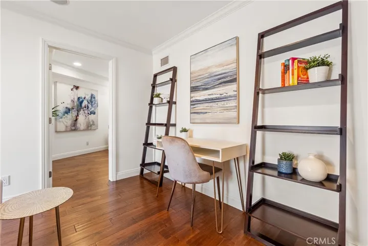 The family room features a versatile bonus room ideal for a home office, guest bedroom, studio, or study space.