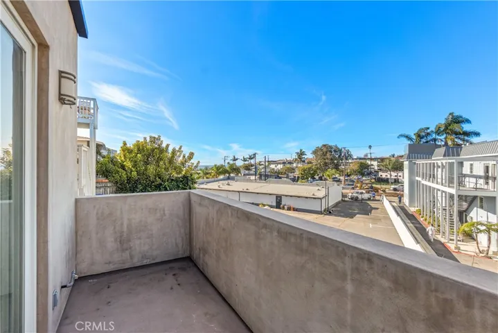The living rooms opens to a balcony with ocean views.