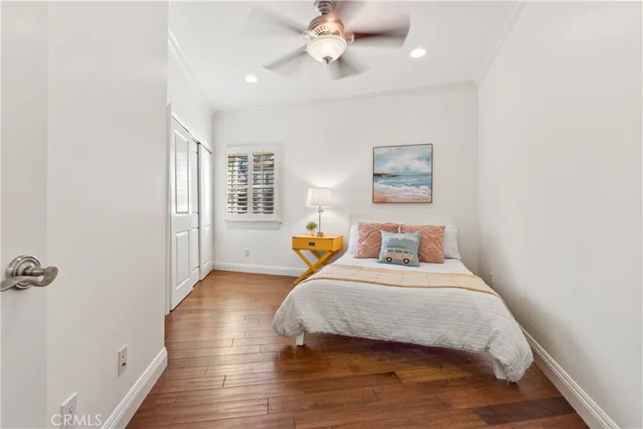 Bedroom #2 - Spacious with recessed lights, ample closet space, and  plantations shutters.