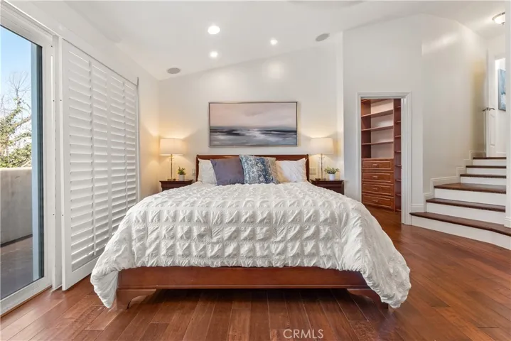 Well-appointed primary suite featuring a large walk-in closet and a serene, spa-like bath designed for relaxation.