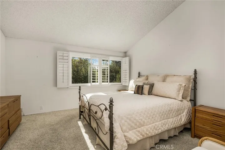 Primary Bedroom with greenbelt view