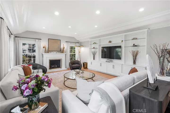 FORMAL LIVING ROOM WITH BUILT IN ENTERTAINMENT CENTER