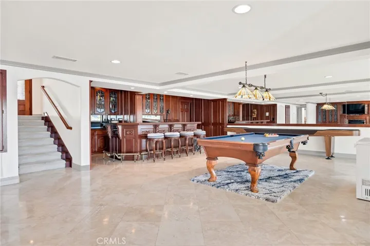 Lower Level - Bar & Game Room area with Covered Patio Access!