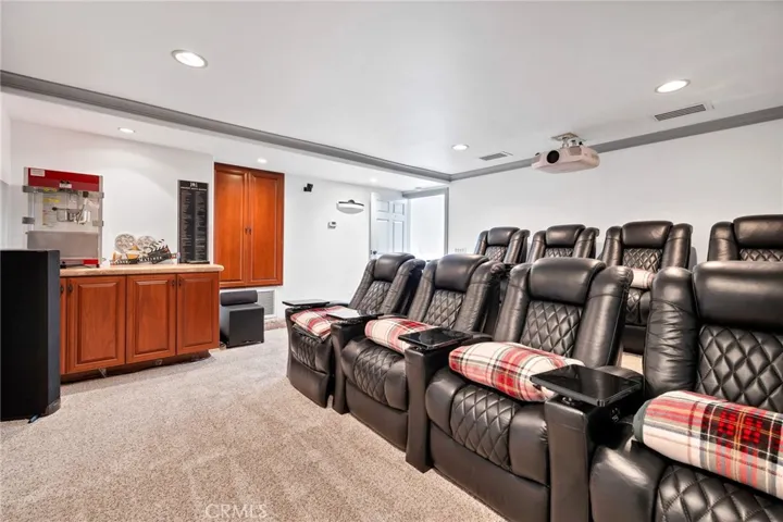 Lower Level - Theatre with custom seating for 8!