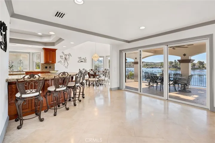 Main Level - Family, Kitchen & Dining Room area with Covered Patio Access!